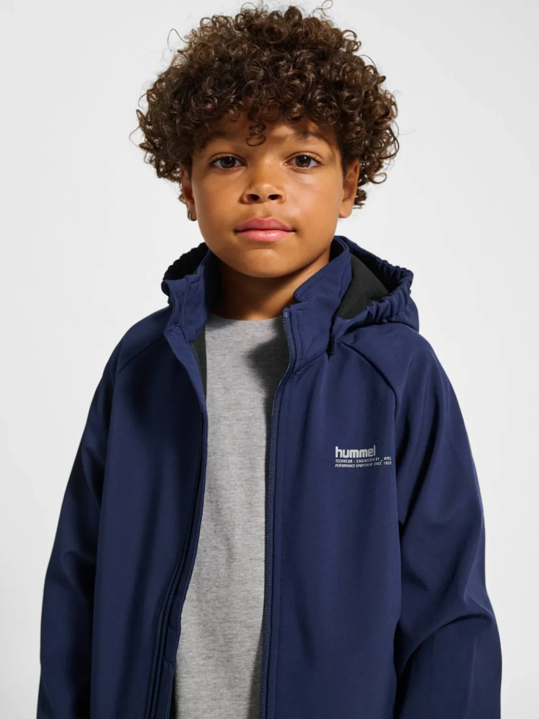 hmlJR LOOSE SOFTSHELL JACKET
