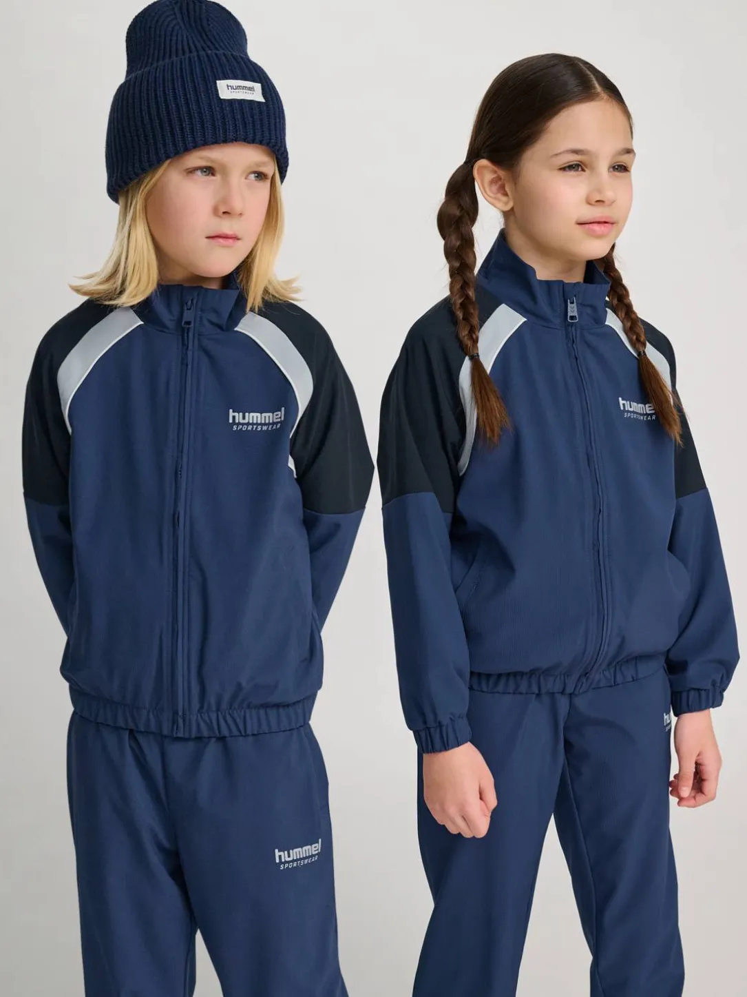 hmlJR LOOSE TRACKSUIT ZIP JACKET