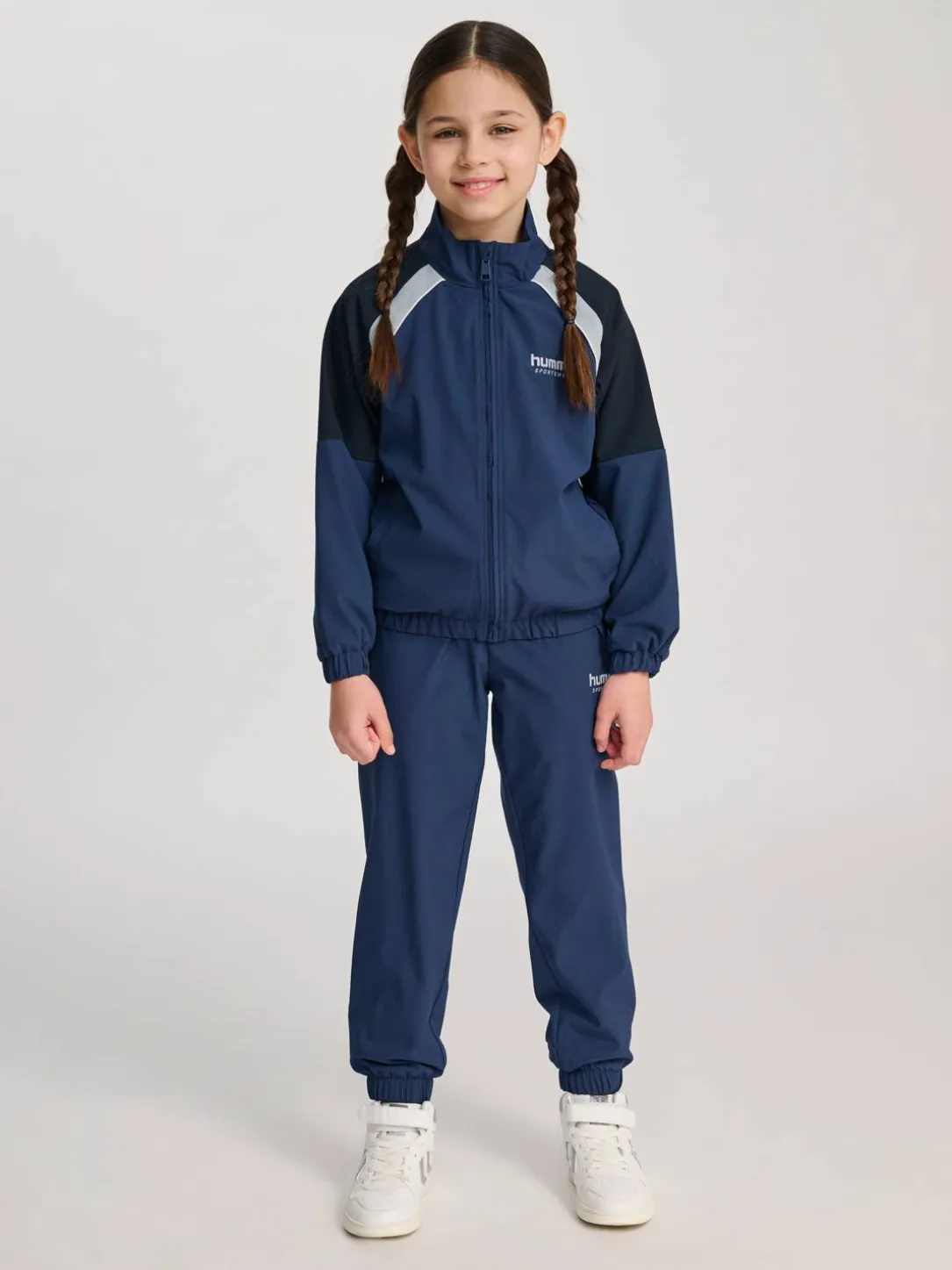 hmlJR LOOSE TRACKSUIT ZIP JACKET