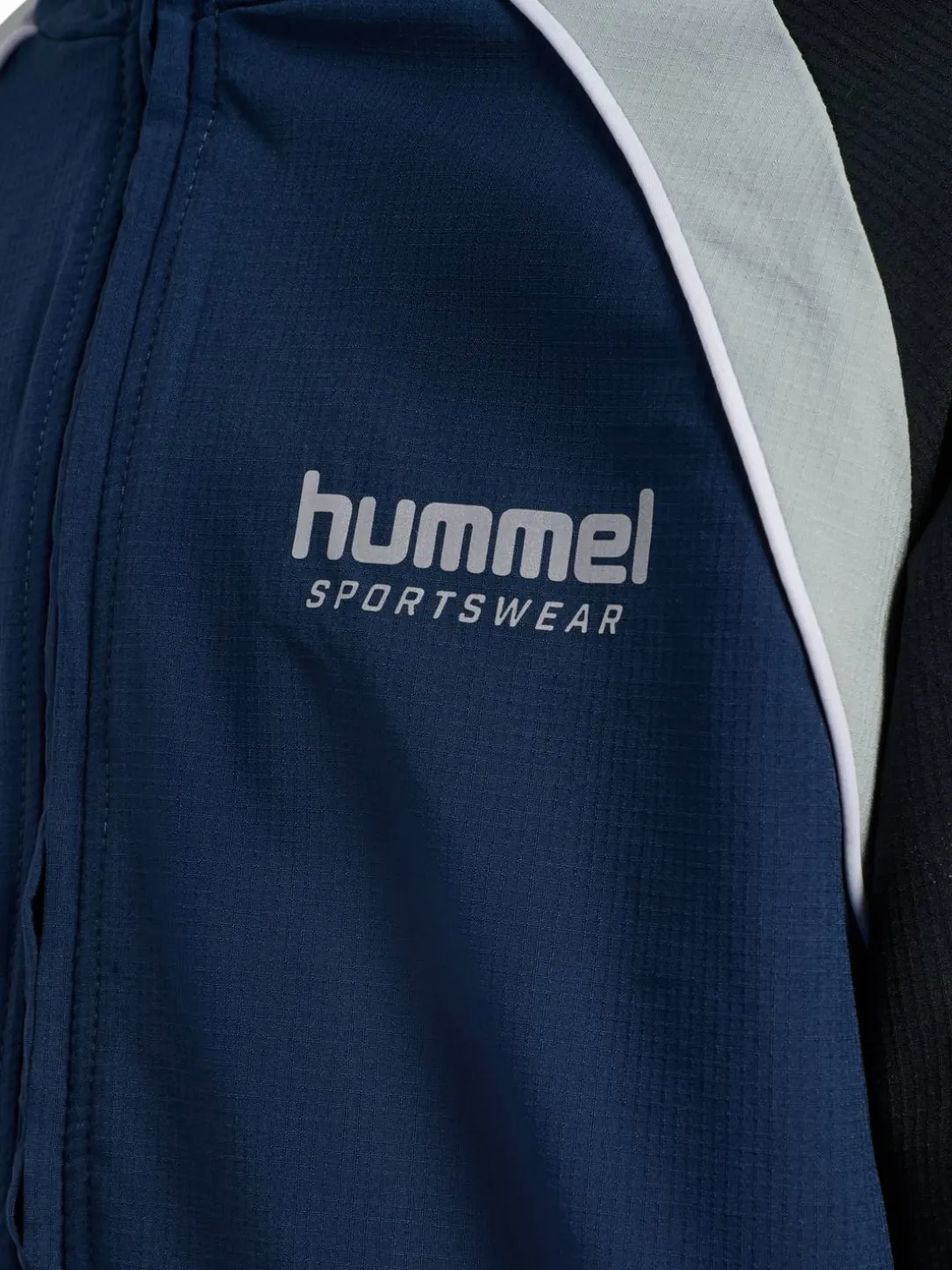 hmlJR LOOSE TRACKSUIT ZIP JACKET