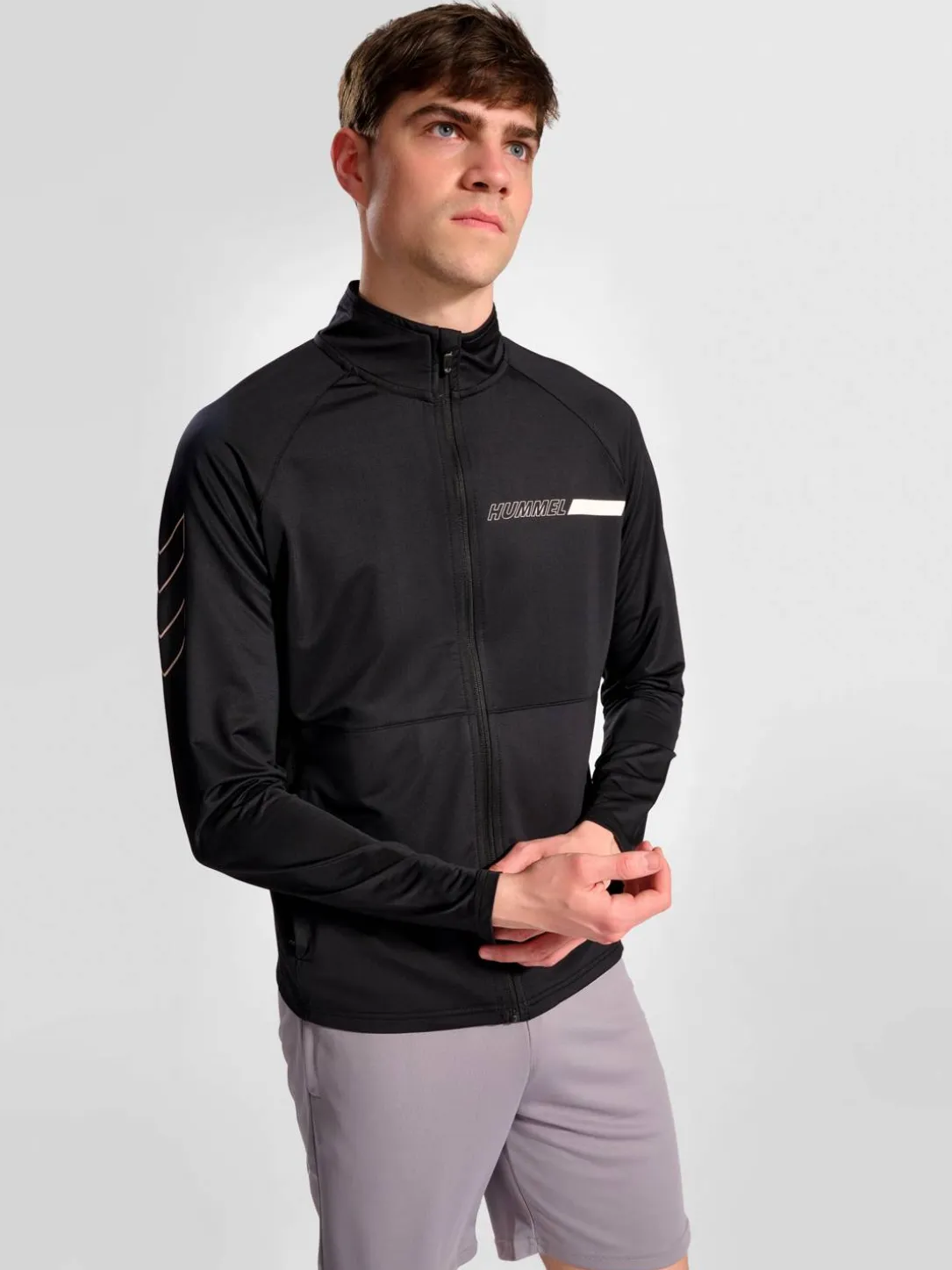 hmlTE STRENGTH TRAINING TRACK TOP