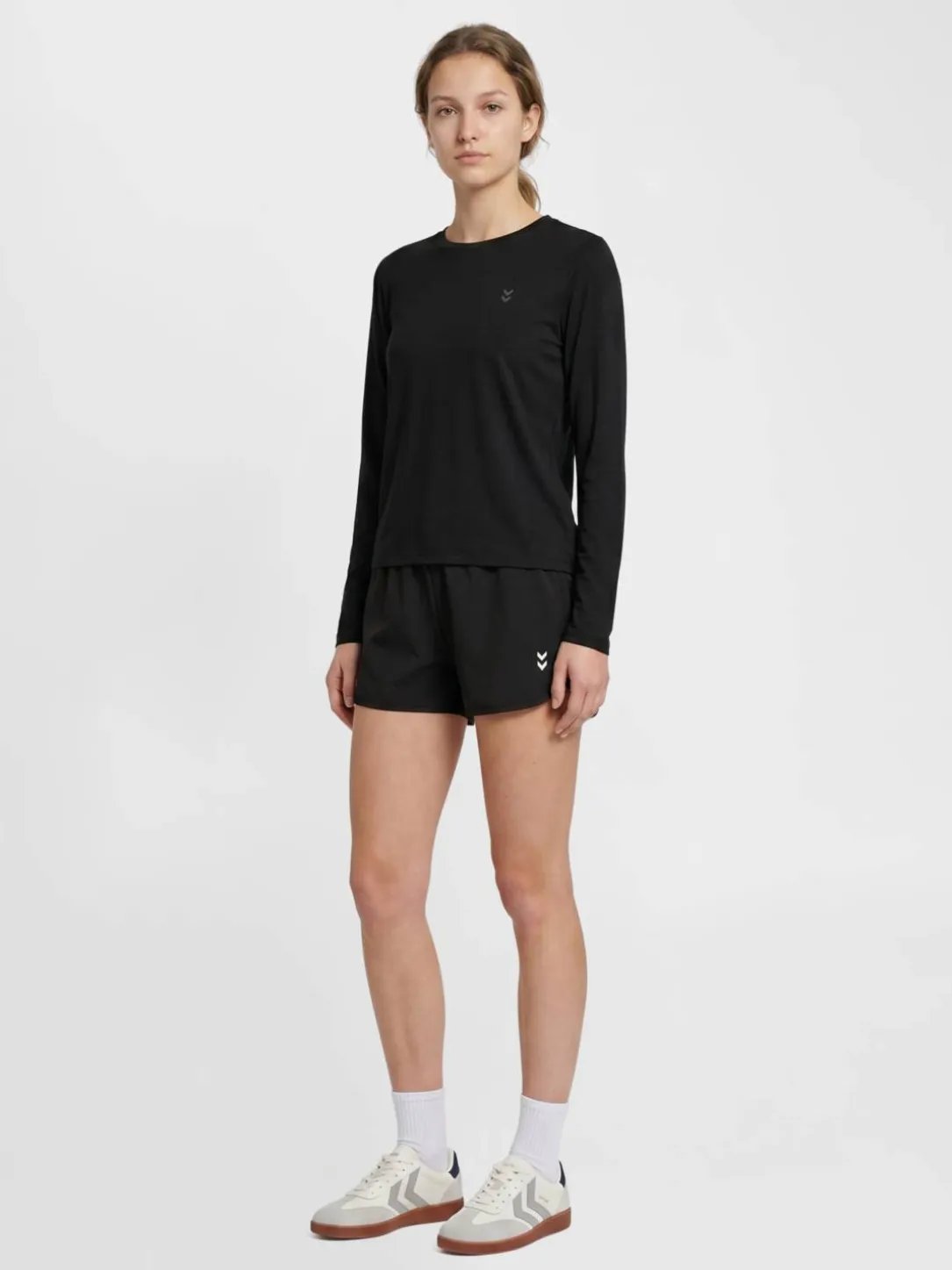 hmlTRAINING W CURVED SHORTS
